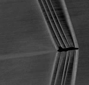 Shockwaves produced by a U.S. Air Force Test Pilot School T-38 banking at Mach 1.05