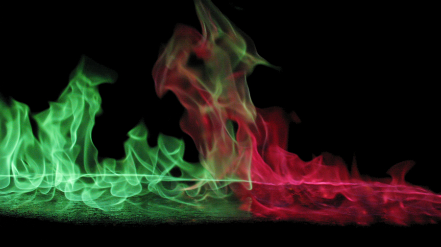A fire whirl mixes flames from methanol doped with lithium to make red